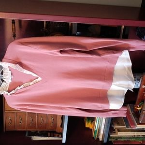 Pink sweater with added blouse details